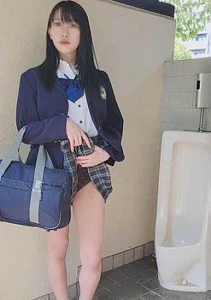 A student with long black hair after school in the public toilet behind the school