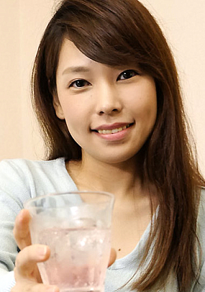 A girl drinking on the street with her panties fully visible
